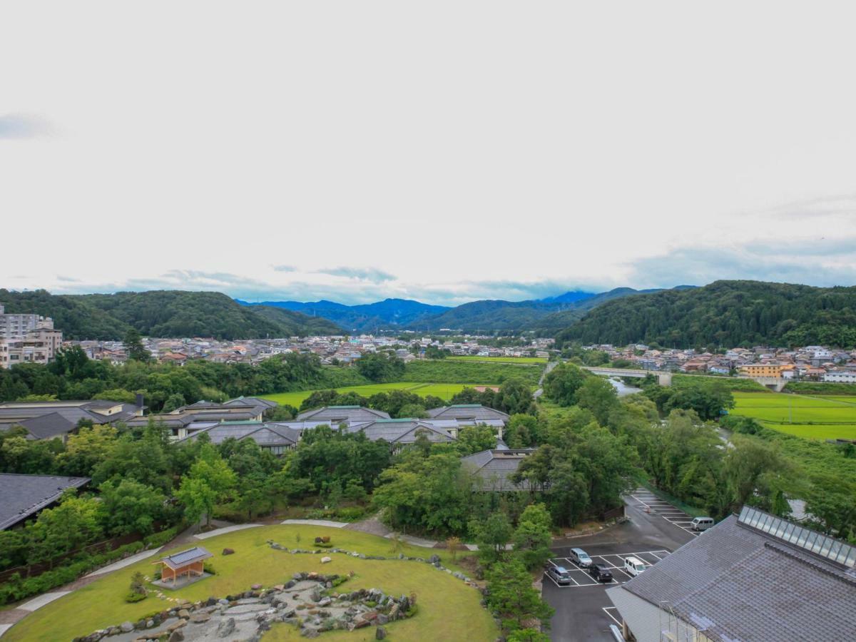 Отель Yamashiro Onsen Miyabi No Yado Kaga Hyakumangoku Экстерьер фото