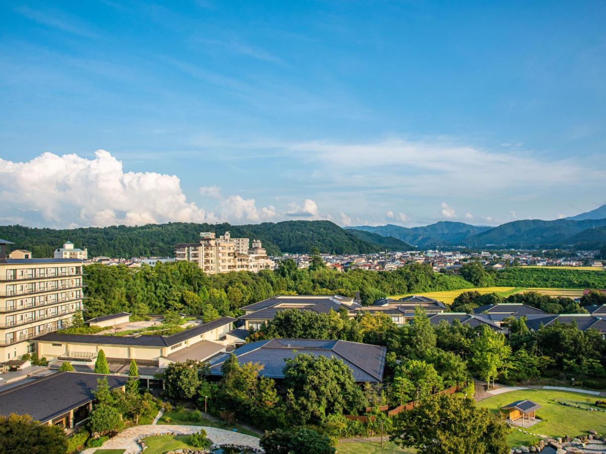 Отель Yamashiro Onsen Miyabi No Yado Kaga Hyakumangoku Экстерьер фото