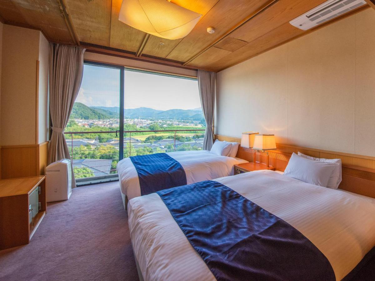 Отель Yamashiro Onsen Miyabi No Yado Kaga Hyakumangoku Экстерьер фото